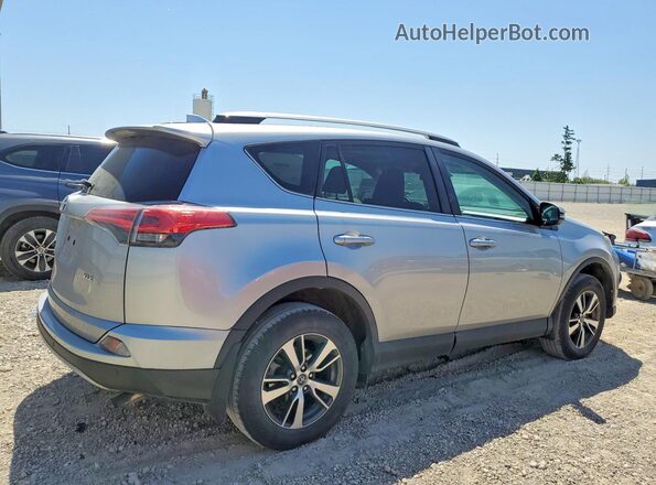 2T3WFREV7HW360858 2017 TOYOTA RAV4 Silver Rear right