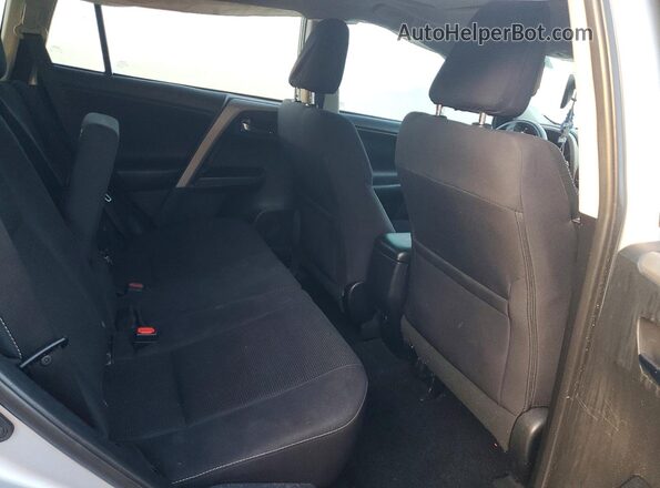 2T3WFREV8JW438666 2018 TOYOTA RAV4 Silver Widok wnętrza z tyłu