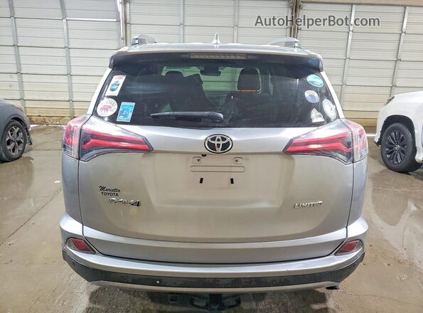 2T3YFREV1HW321904 2017 TOYOTA RAV4 Silver Widok z tyłu