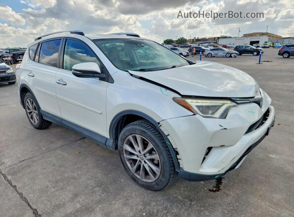 2T3YFREV2GW258987 2016 TOYOTA RAV4 White Передня права чверть
