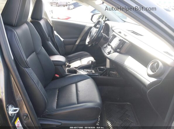2T3YFREV7GW301333 2016 TOYOTA RAV4 Gray Vista interior delantera