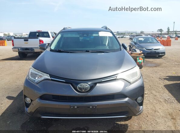 2T3YFREV7GW301333 2016 TOYOTA RAV4 Gray Vista del cuadro de instrumentos