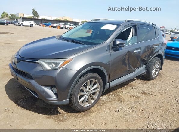 2T3YFREV7GW301333 2016 TOYOTA RAV4 Gray Vista tres cuartos delantera izquierda