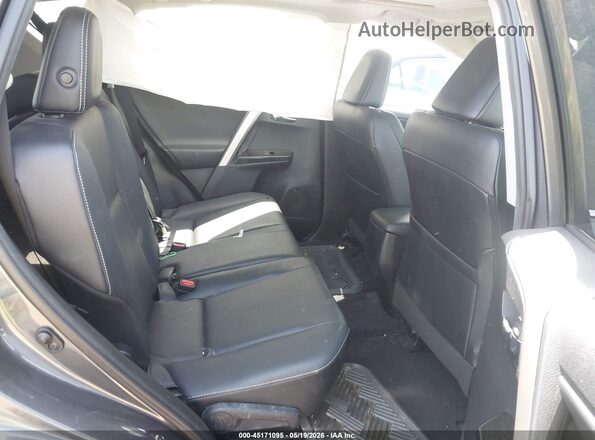 2T3YFREV7GW301333 2016 TOYOTA RAV4 Gray Vista de la etiqueta del VIN