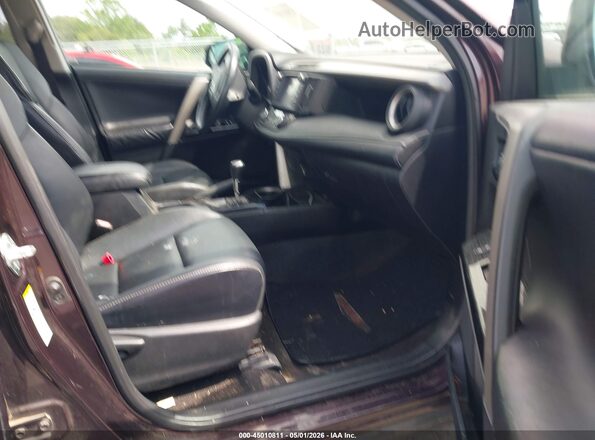 2T3YFREV8HW374437 2017 TOYOTA RAV4 Purple Widok wnętrza z przodu