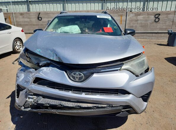 2T3ZFREV0HW388935 2017 TOYOTA RAV4 Серебряный Вид спереди