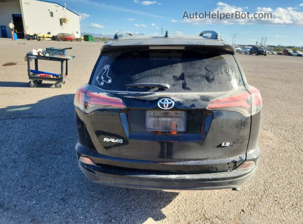 2T3ZFREV1JW428042 2018 TOYOTA RAV4 Черный Вид сзади