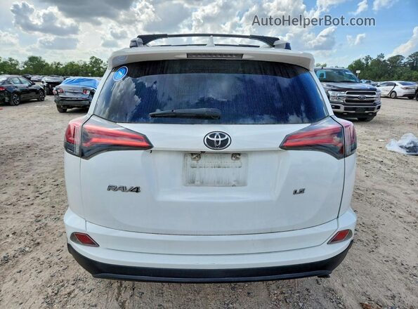 2T3ZFREV2GW293470 2016 TOYOTA RAV4 White Vista trasera