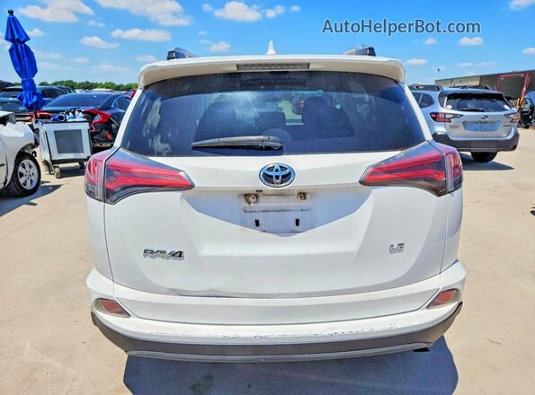 2T3ZFREV2HW320815 2017 TOYOTA RAV4 White Rear view