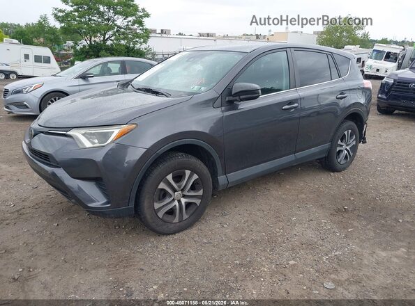 2T3ZFREV2HW382649 2017 TOYOTA RAV4 Gray Vista tres cuartos delantera izquierda
