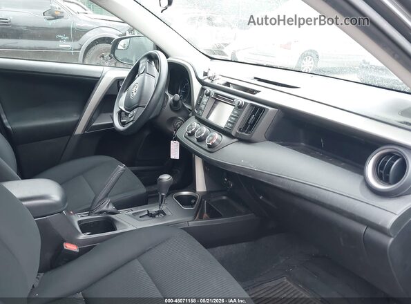 2T3ZFREV2HW382649 2017 TOYOTA RAV4 Gray Vista interior delantera