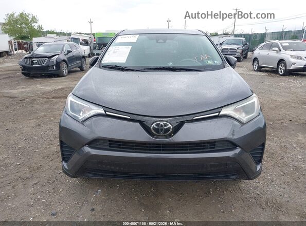 2T3ZFREV2HW382649 2017 TOYOTA RAV4 Gray Vista del salpicadero