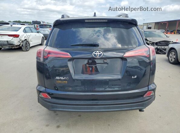2T3ZFREV2JW495121 2018 TOYOTA RAV4 Black Vista trasera
