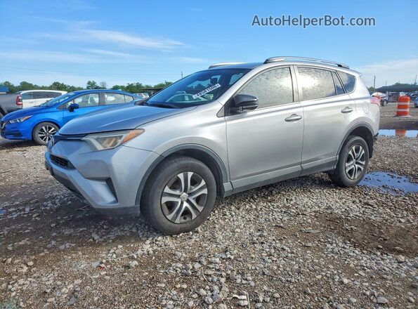 2T3ZFREV4HW362211 2017 TOYOTA RAV4 Silver Vista tres cuartos delantera izquierda