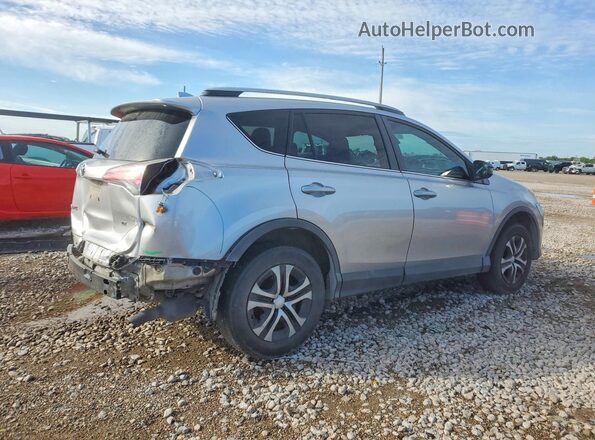 2T3ZFREV4HW362211 2017 TOYOTA RAV4 Silver Trasero derecho