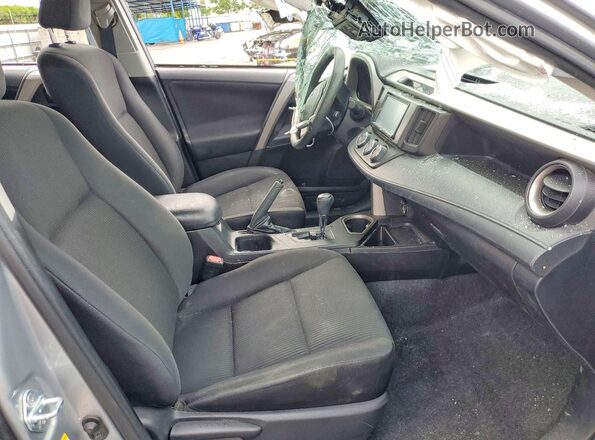 2T3ZFREV4HW371832 2017 TOYOTA RAV4 Silver Widok wnętrza z przodu