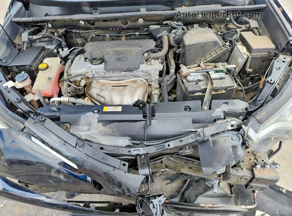 2T3ZFREV4HW390168 2017 TOYOTA RAV4 Black Vista interior trasera