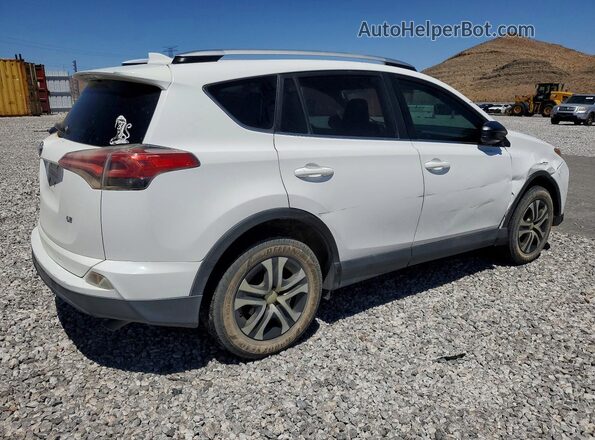2T3ZFREV5GW258812 2016 TOYOTA RAV4 White Rear right