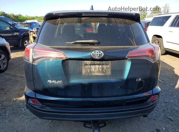 2T3ZFREV5JW502059 2018 TOYOTA RAV4 Blue Rear view