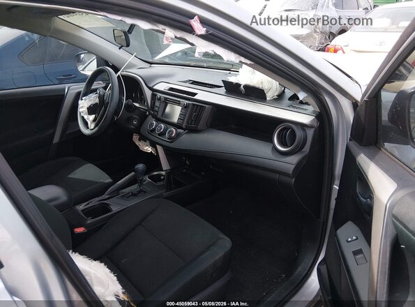 2T3ZFREV7GW252056 2016 TOYOTA LE Серый Вид салона спереди