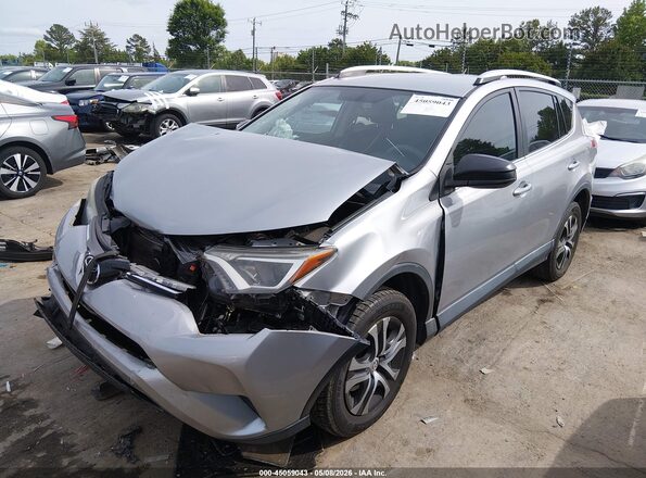 2T3ZFREV7GW252056 2016 TOYOTA LE Серый Передняя левая четверть