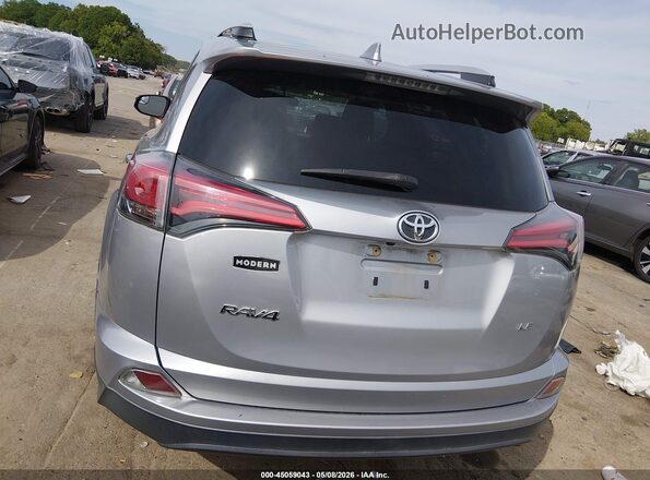 2T3ZFREV7GW252056 2016 TOYOTA LE Серый 
