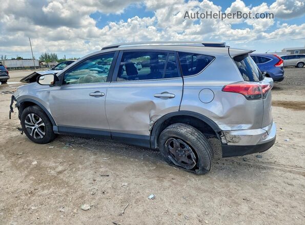 2T3ZFREV7GW264658 2016 TOYOTA RAV4 Gray Tył lewy