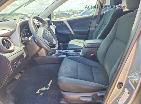2T3ZFREV7GW264658 2016 TOYOTA RAV4 Gray Widok wnętrza z przodu