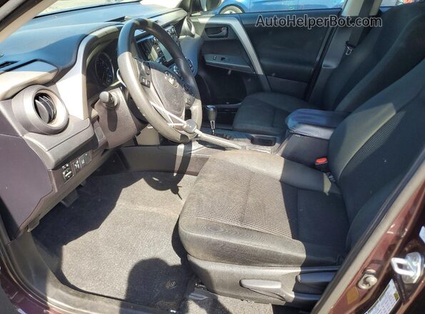 2T3ZFREV7HW364003 2017 TOYOTA RAV4 Purple Front interior view