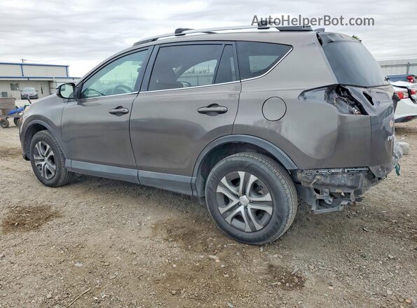 2T3ZFREV9GW235128 2016 TOYOTA RAV4 Gray Trasero izquierdo