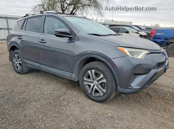 2T3ZFREV9GW235128 2016 TOYOTA RAV4 Gray Delantero derecho