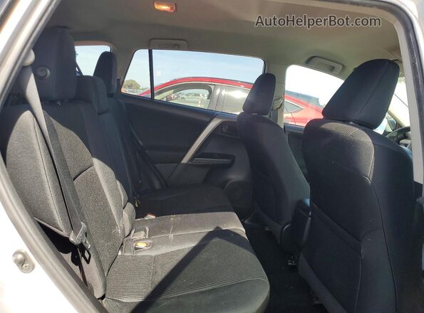 2T3ZFREV9HW387671 2017 TOYOTA RAV4 Серебряный Вид задней части салона