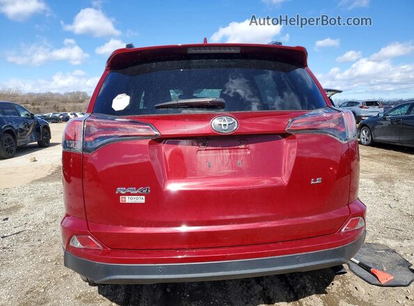 2T3ZFREV9JW478283 2018 TOYOTA RAV4 Бордовый Вид сзади
