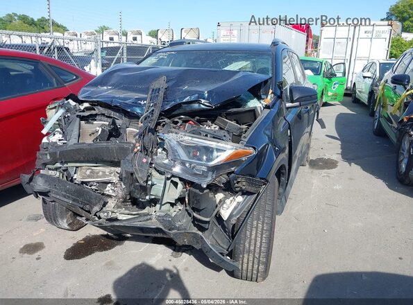 2T3ZFREV9JW497206 2018 TOYOTA LE Blue Вид спереду