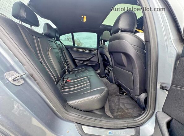 WBAJB1C56JB374403 2018 BMW OTHER Charcoal Вид салону спереду