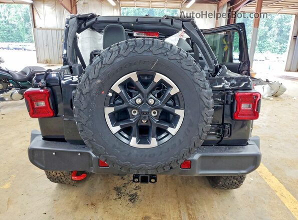 1C4PJXFGXTW263588 2026 JEEP WRANGLER Черный Вид салона спереди