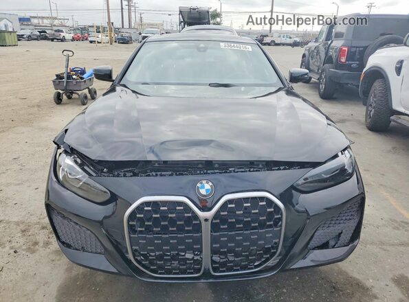 WBY43AW04RFS63784 2024 BMW I4 Black Vista trasera