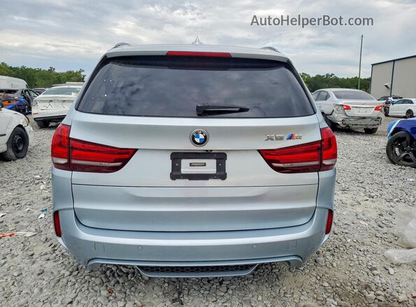 5YMKT6C35H0U39318 2017 BMW X5 Серебряный Вид салона спереди