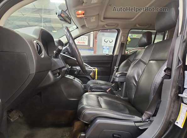 1C4NJDEB7GD723934 2016 JEEP COMPASS Черный Вид панели приборов
