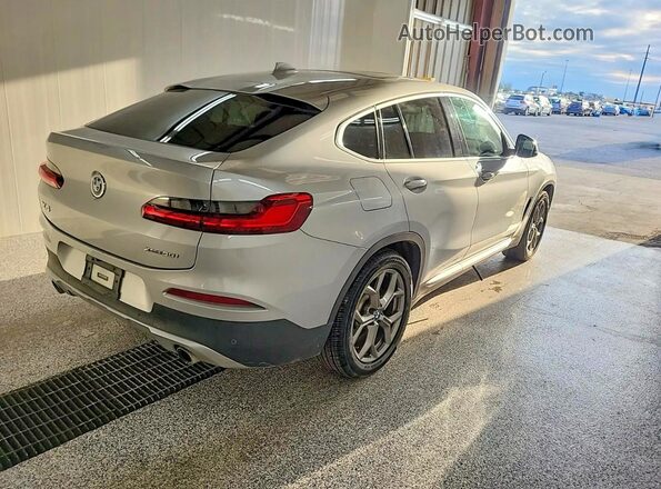 5UX2V1C06M9E06590 2021 BMW X4 Серый Передняя правая четверть