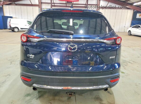 JM3TCBDY0G0103999 2016 MAZDA CX-9 Blue Widok wnętrza z przodu
