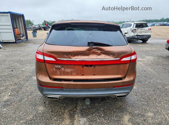 2LMPJ7JR8GBL23142 2016 LINCOLN MKX Коричневый Вид салона спереди