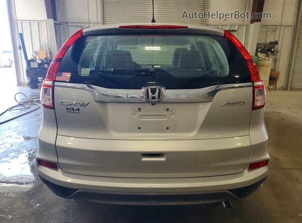 5J6RM4H3XGL126094 2016 HONDA CRV Серебряный Вид салона спереди