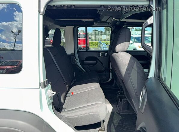 1C4HJXDN7PW509945 2023 JEEP WRANGLER Gray Widok wnętrza z przodu