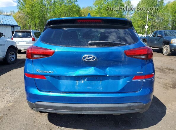 KM8J2CA43KU939748 2019 HYUNDAI TUCSON Синий Вид салона спереди