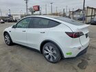 2023 Tesla Model Y White vin: 7SAYGAEEXPF742736