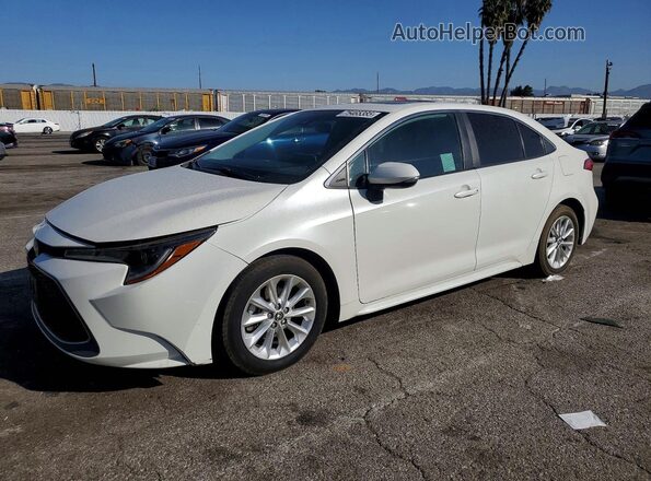 5YFFPMAE1MP146961 2021 TOYOTA COROLLA Белый Передняя левая четверть