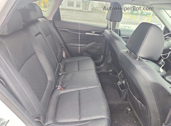 KNDETCA24P7400062 2023 KIA SELTOS Белый Вид задней части салона