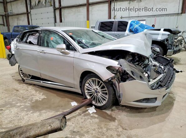 3FA6P0H99GR325819 2016 FORD FUSION Серебряный Передняя правая четверть