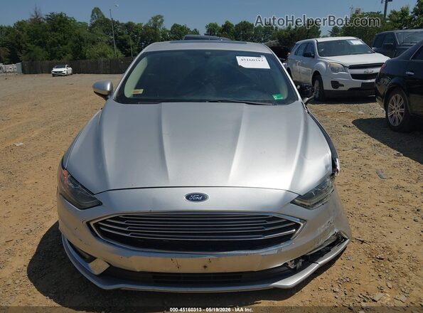 3FA6P0LU5HR382175 2017 FORD FUSION HYBRID Серебряный Вид задней части салона